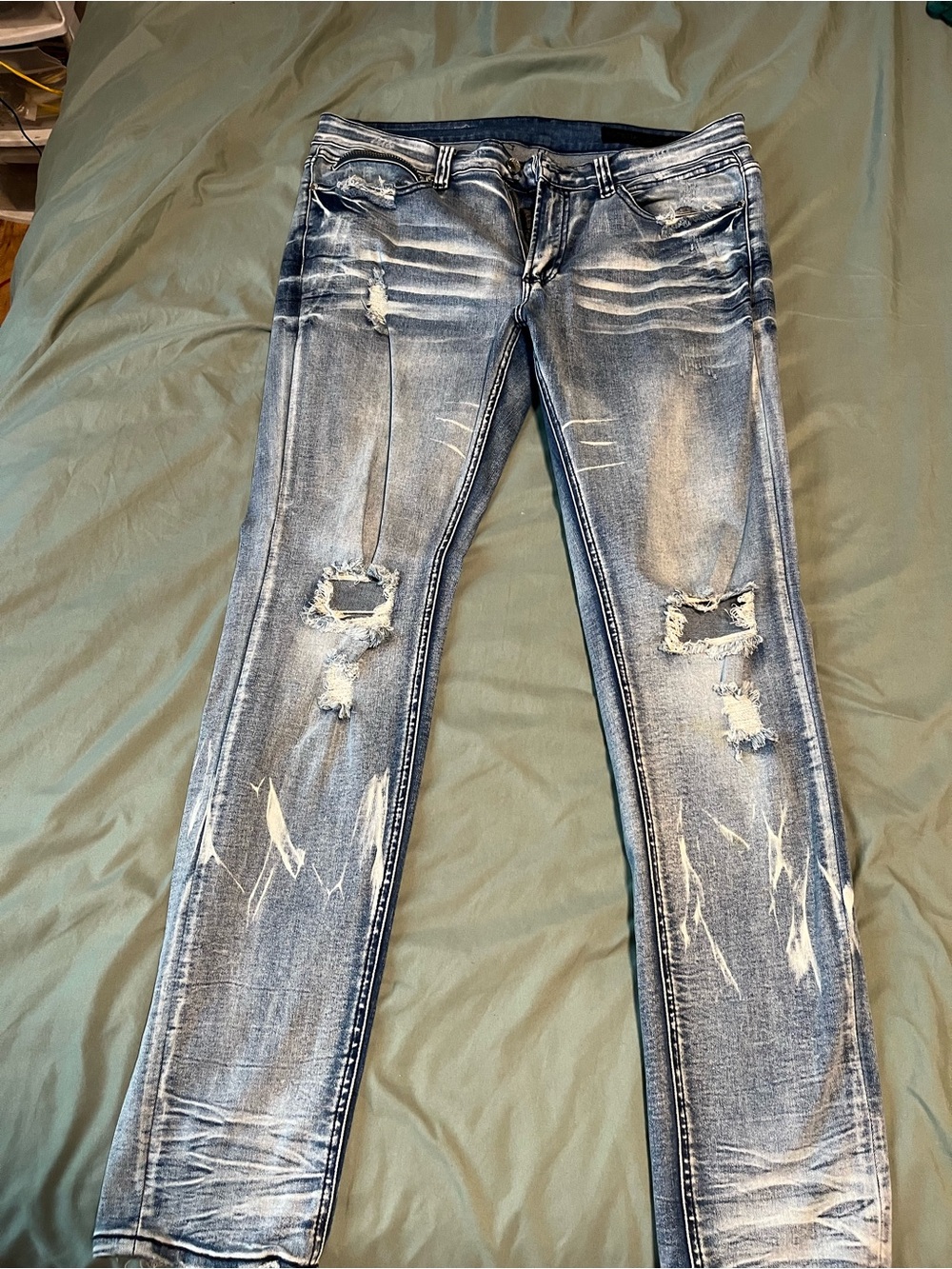 Slim Fit Distressed Men's Jeans in Light Blue Wash